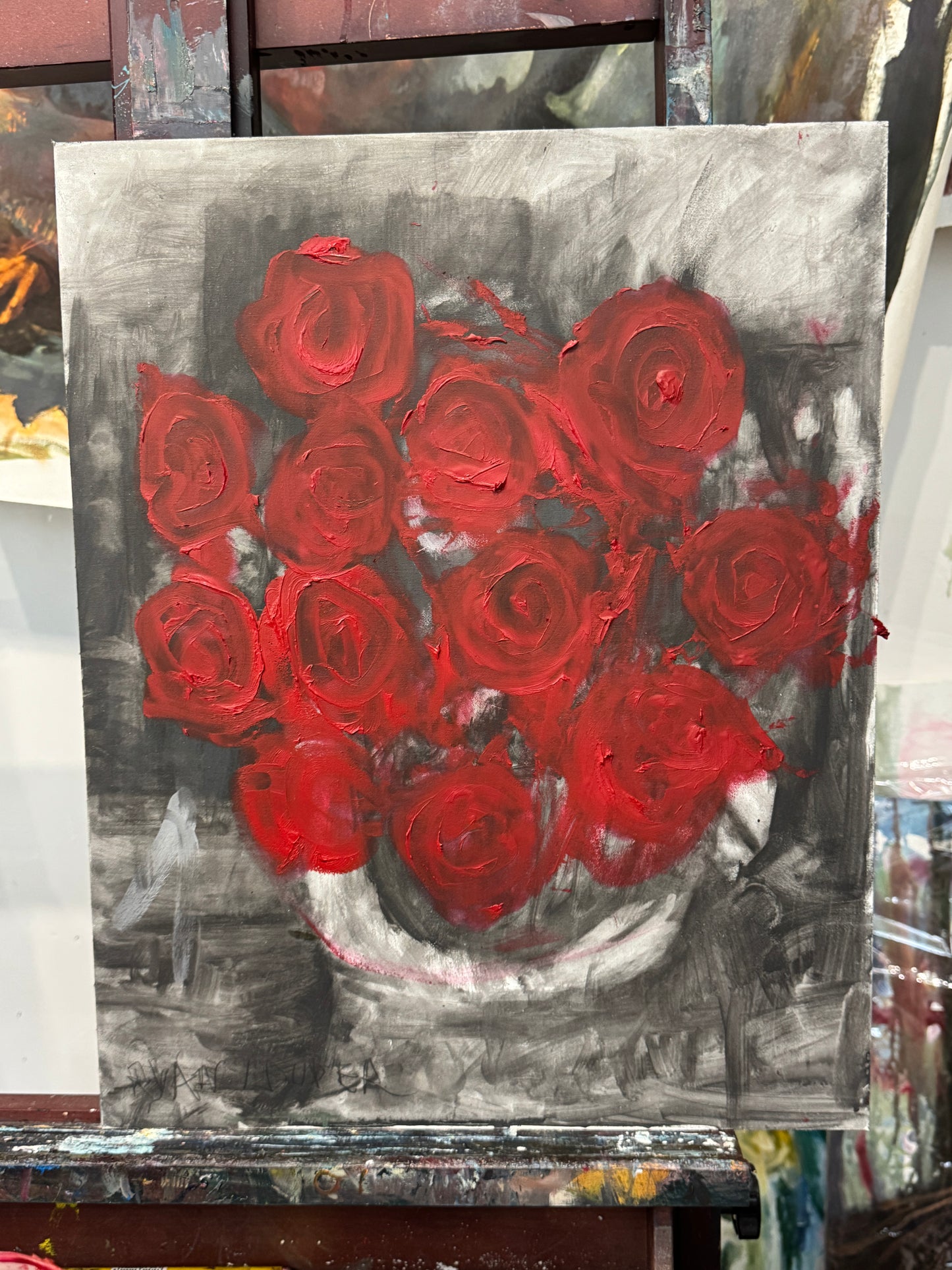 A painting titled 'Dozen Red Roses' by Ryan Louder