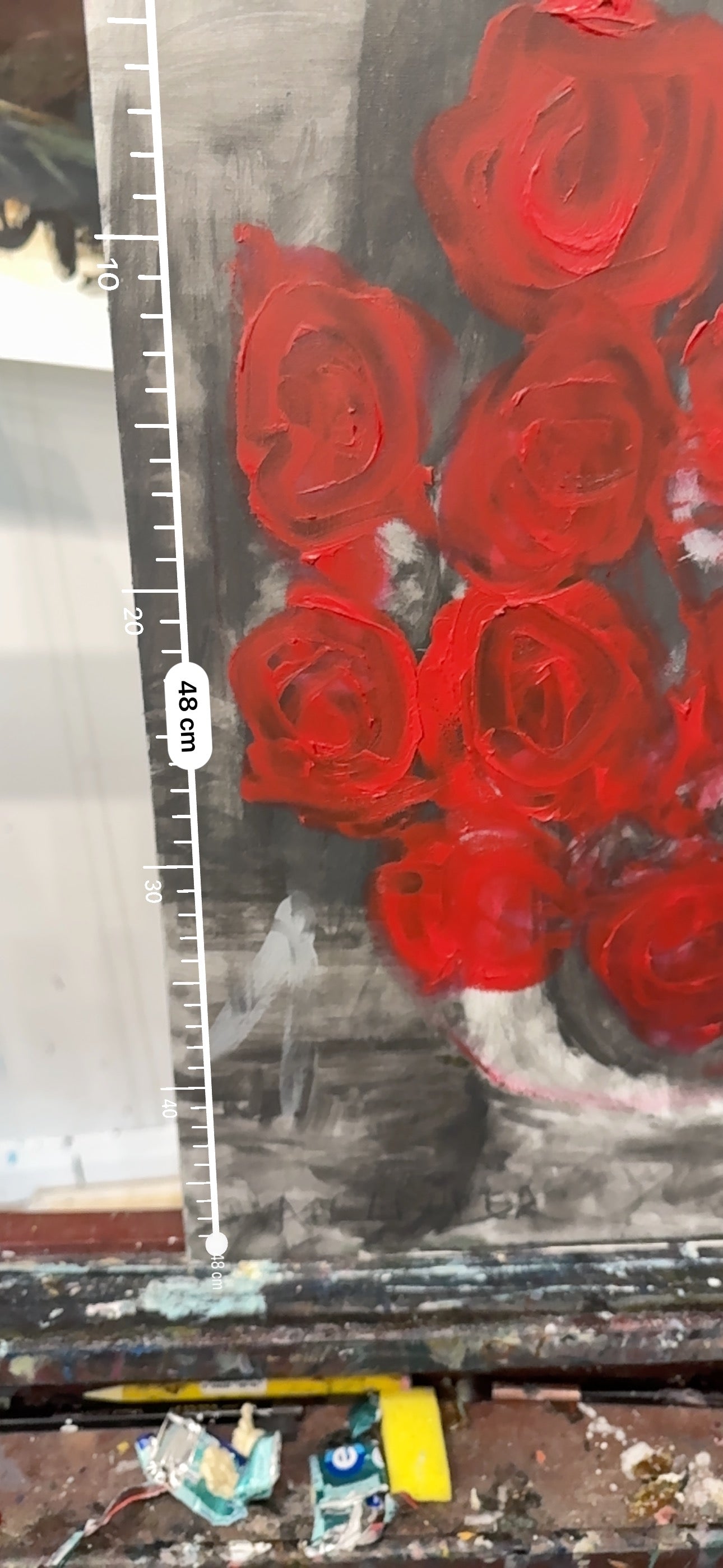 A painting titled 'Dozen Red Roses' by Ryan Louder