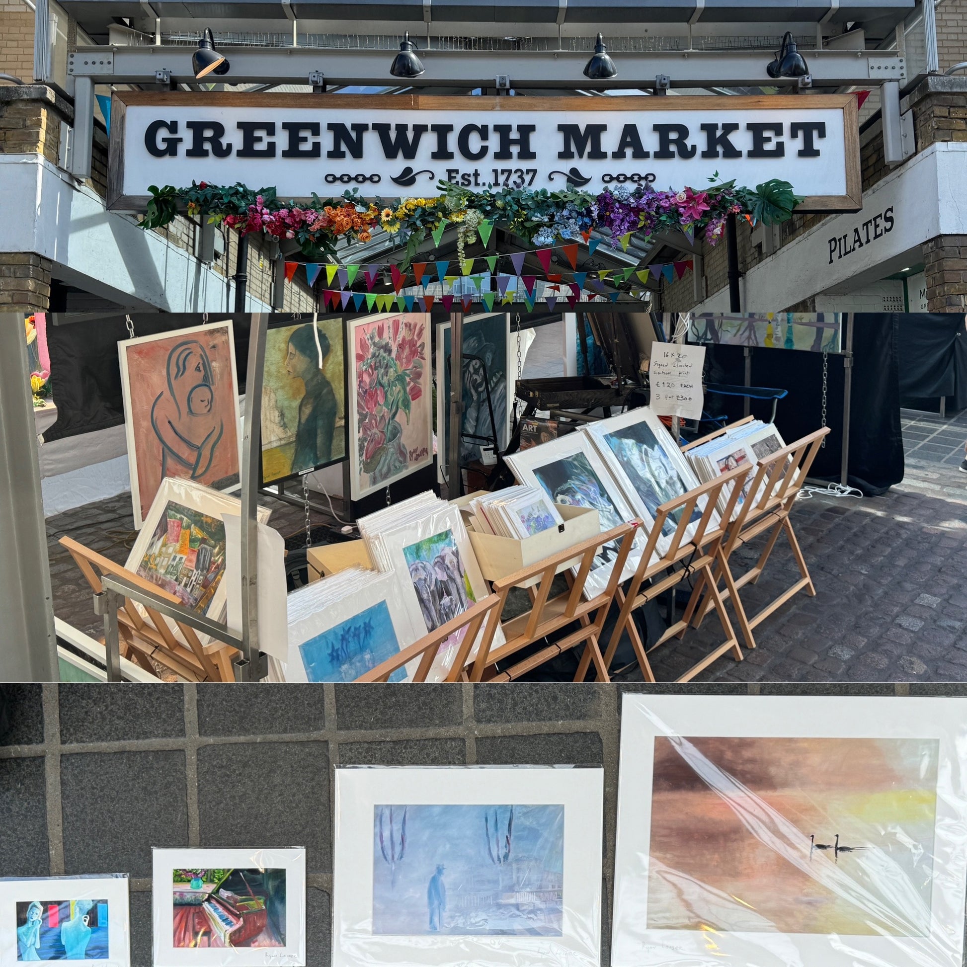 a bunch of paintings are on display in front of a market